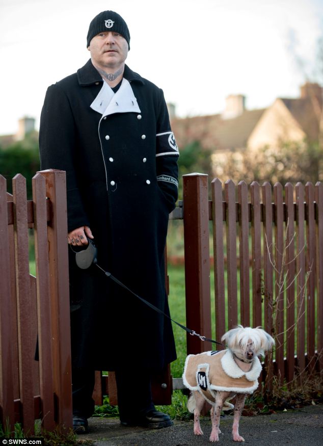 'Woof-waffe': Paul Dutton spent weeks creating the sheepskin outfit for dog Albert and said that he and his dog could 'march as Hitler's men' in their matching clothing