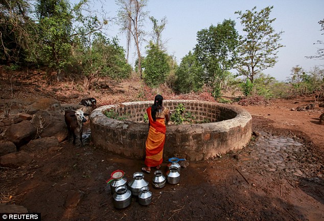 2959DD4A00000578-3111521-For_villagers_in_Denganmal_the_only_drinking_water_comes_from_tw-a-2_1433457010508